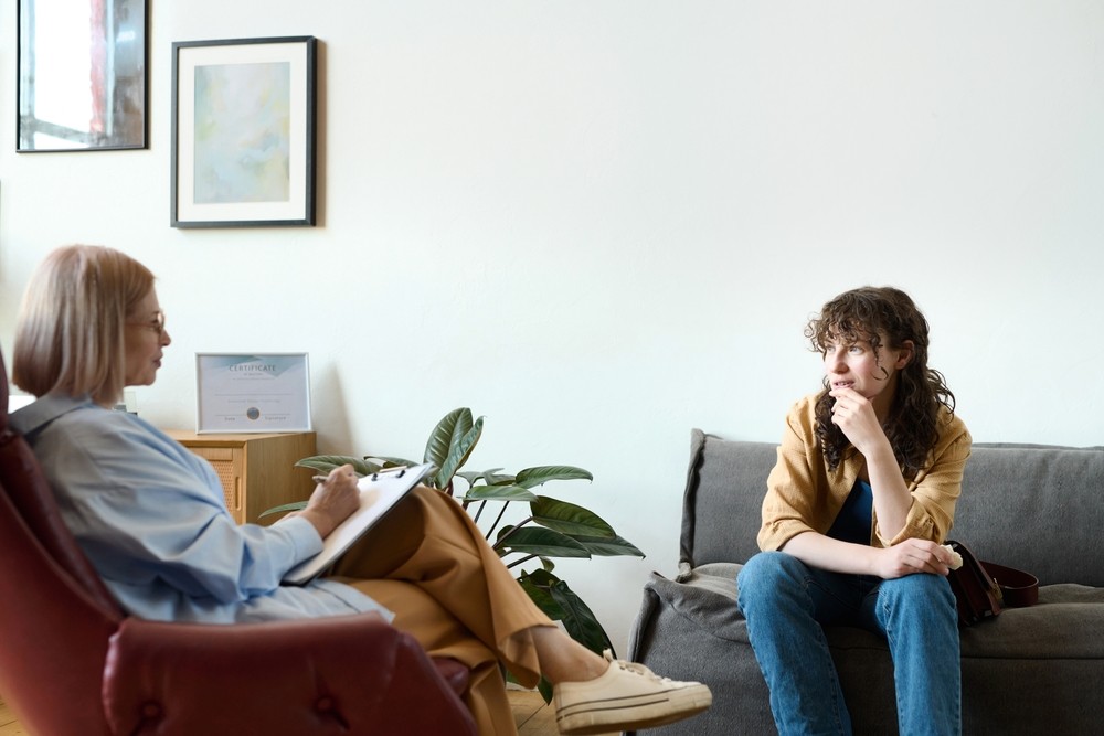 Counseling Session for Alcohol Recovery Support Person in therapy session for alcohol addiction support