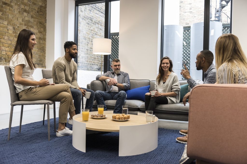 Alcohol Rehab Sutton: Supportive Group Therapy Session Group therapy session at alcohol rehab Sutton, people sharing experiences.