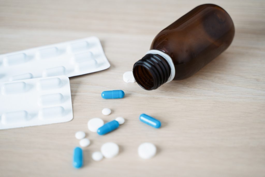 Diazepam Addiction: Understanding Pill Dependency Pills and bottle representing diazepam addiction and recovery