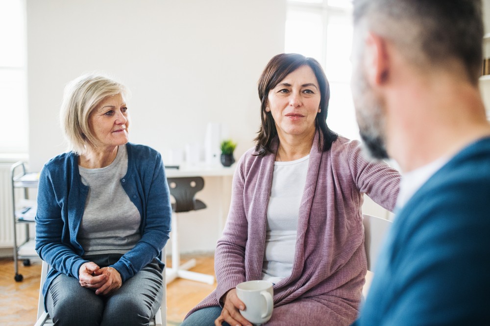 Group Therapy Session for Alcohol Recovery Support Group discussing alcohol rehab during support session