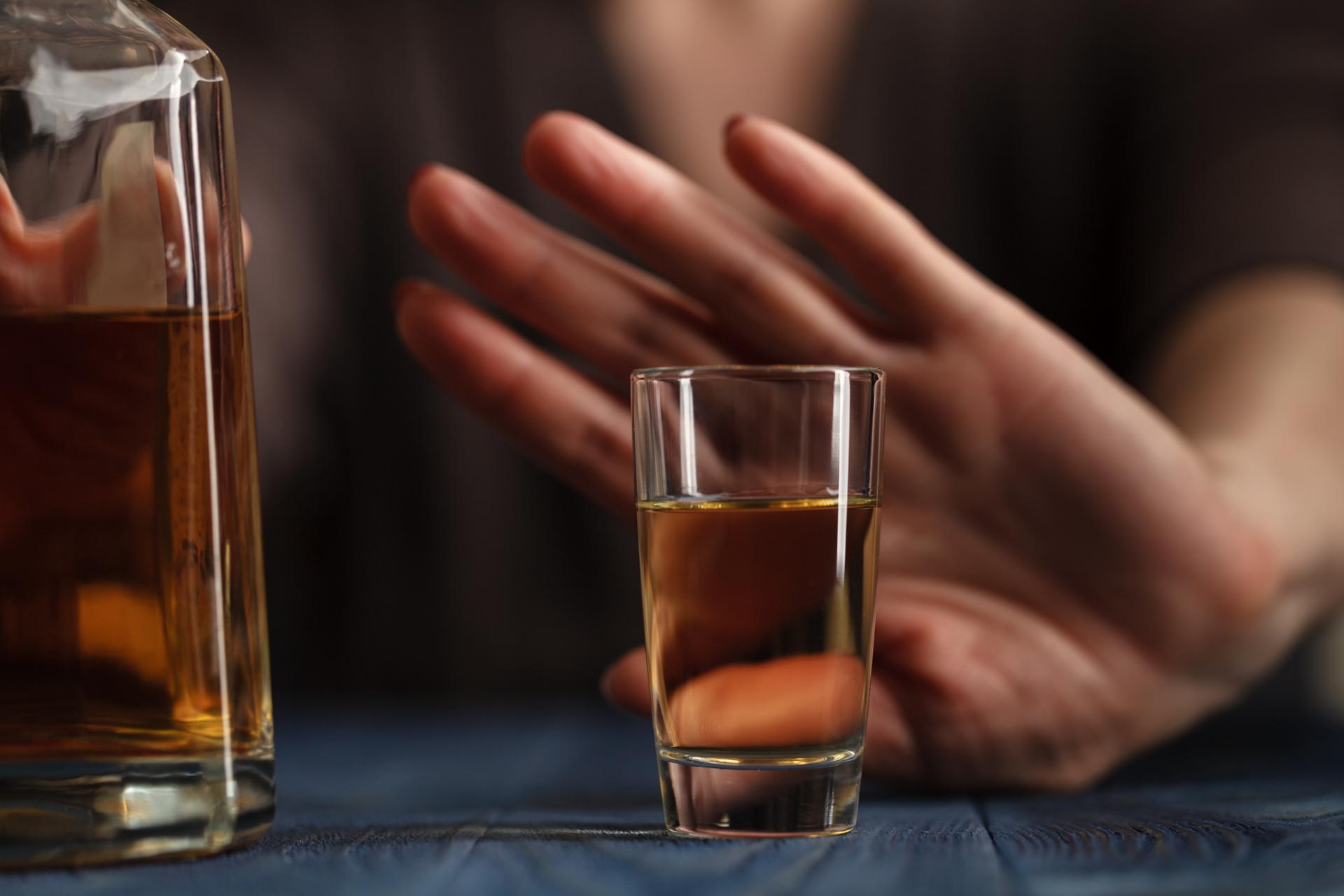 Rehab Liverpool: Choosing Alcohol Recovery Hand pushing away alcohol in rehab Liverpool program