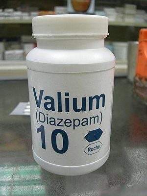 Valium Withdrawals: Understanding Symptoms during Recovery A bottle of Valium (diazepam 10 mg) is placed on a counter, clearly labelled and visible.